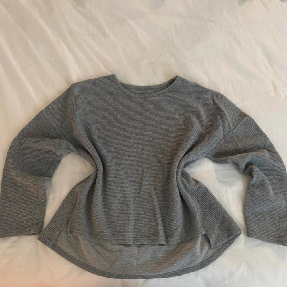 Gray sweater with front side zipper detail